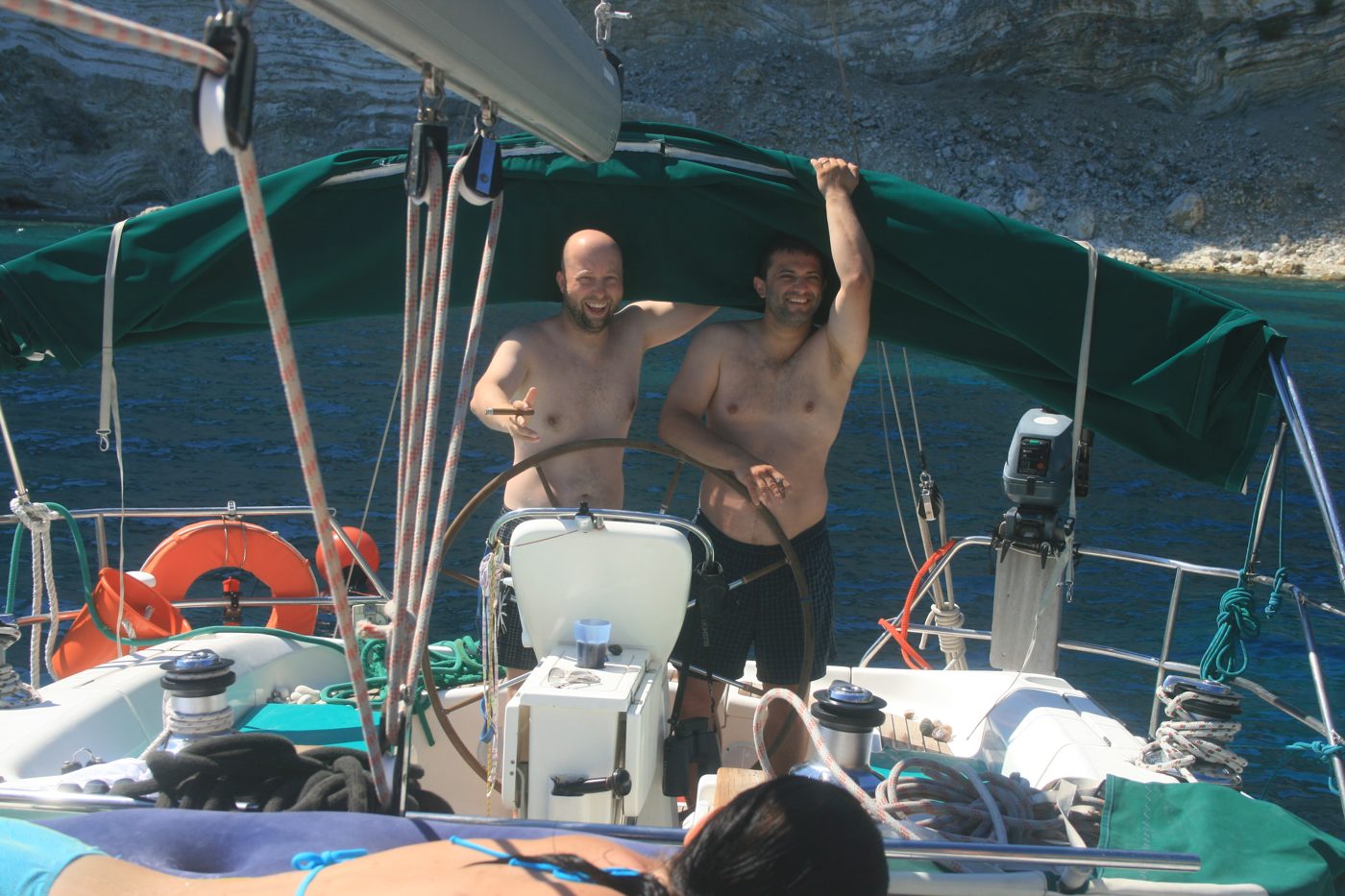 With a friend on the deck of a sailing yacht